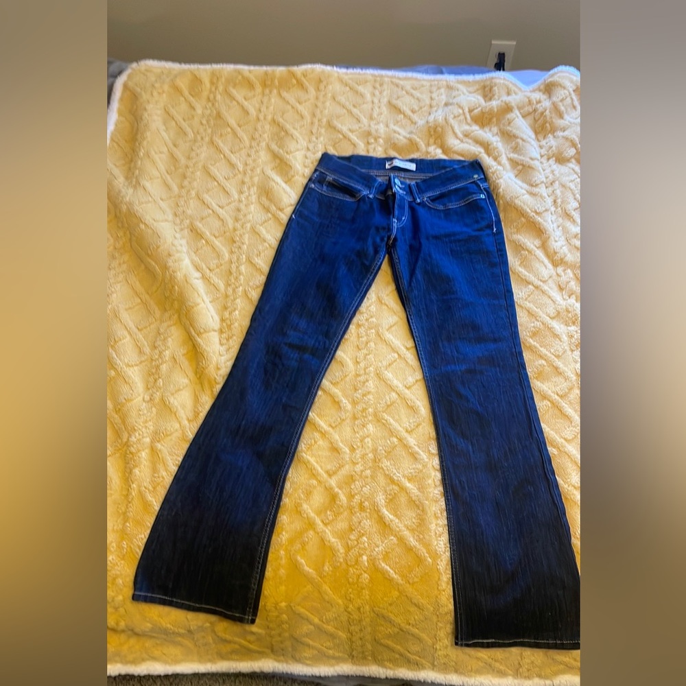 Women’s Levi’s dark wash denim flare jeans.